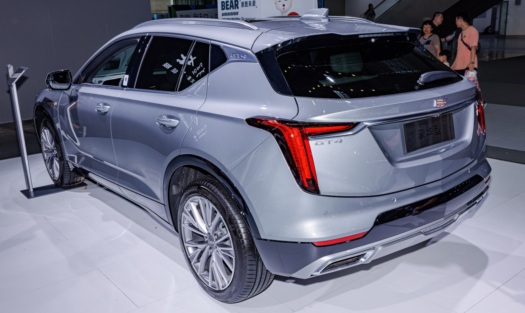 Rear and side design highlights with distinct taillights and aerodynamic curves