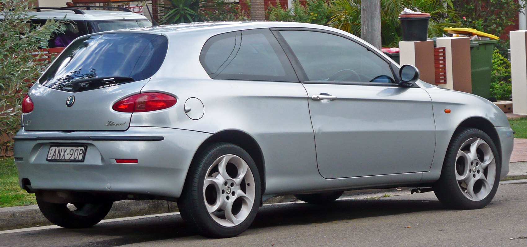 Silver 3-door hatchback rear side view with alloy wheels