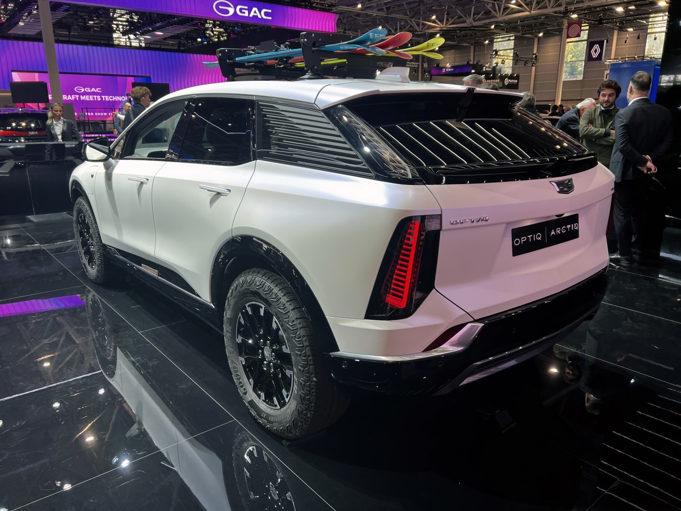 Sleek SUV with roof rack and off-road tires