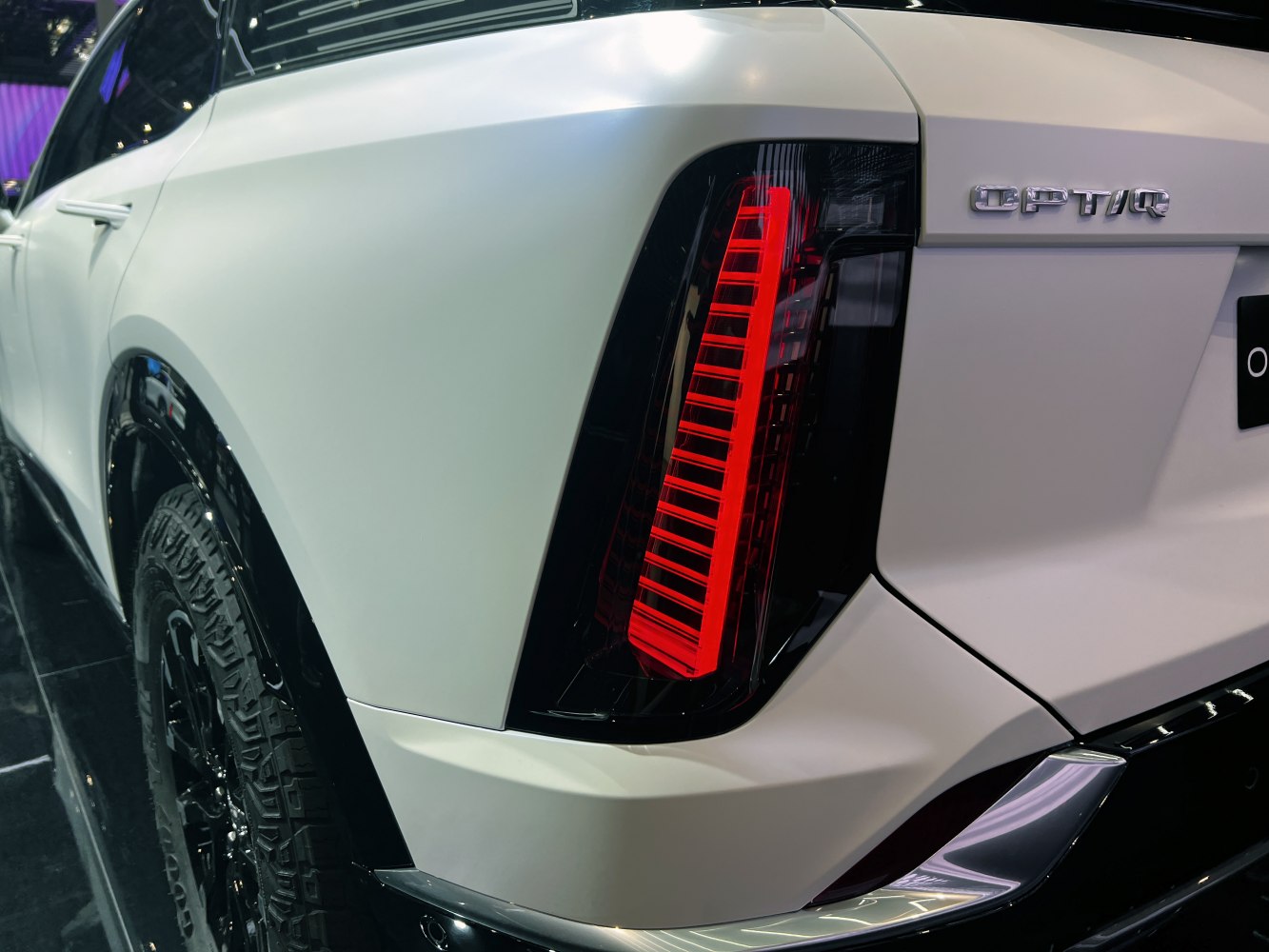Rear LED tail light and rugged wheel design on SUV