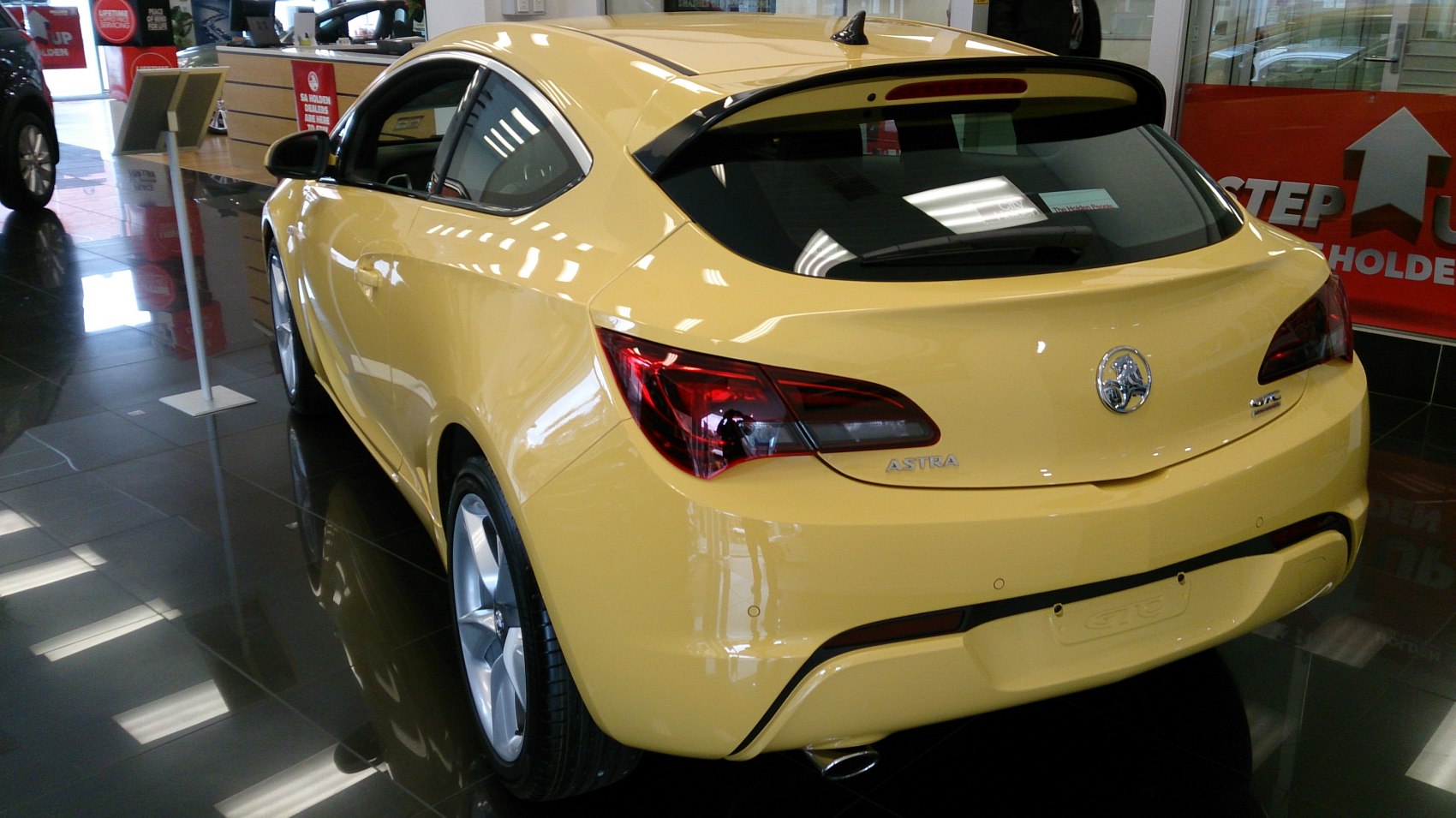 Sporty hatchback rear and side view with distinct taillights