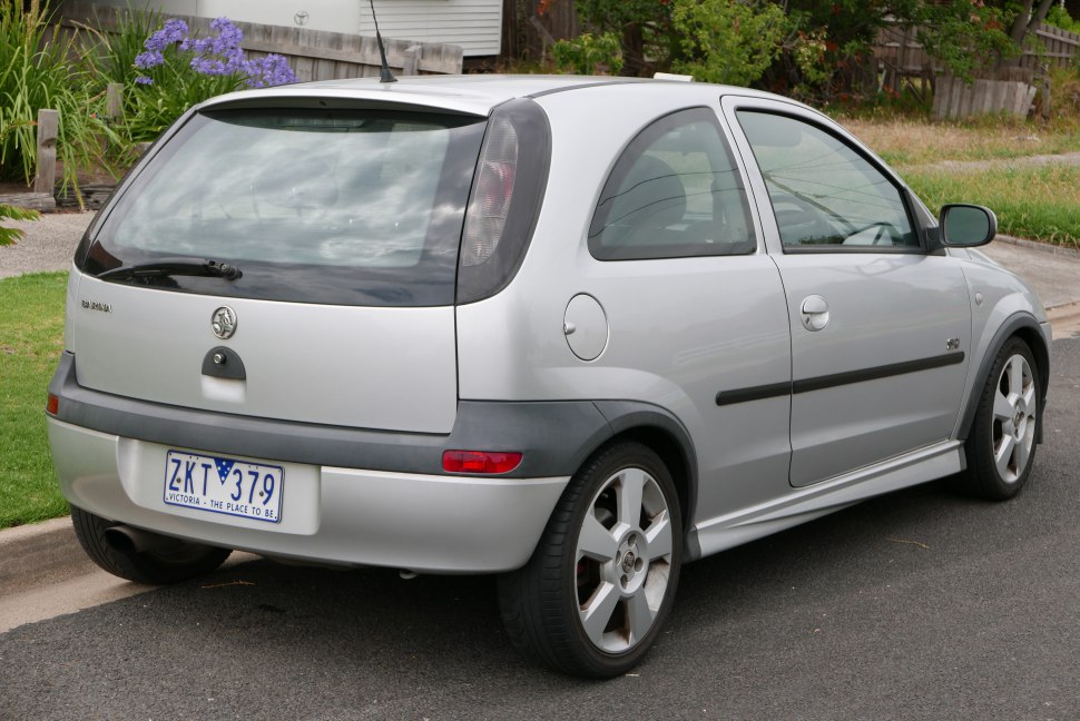 Rear and side view of a compact hatchback with distinctive taillights and alloy wheels