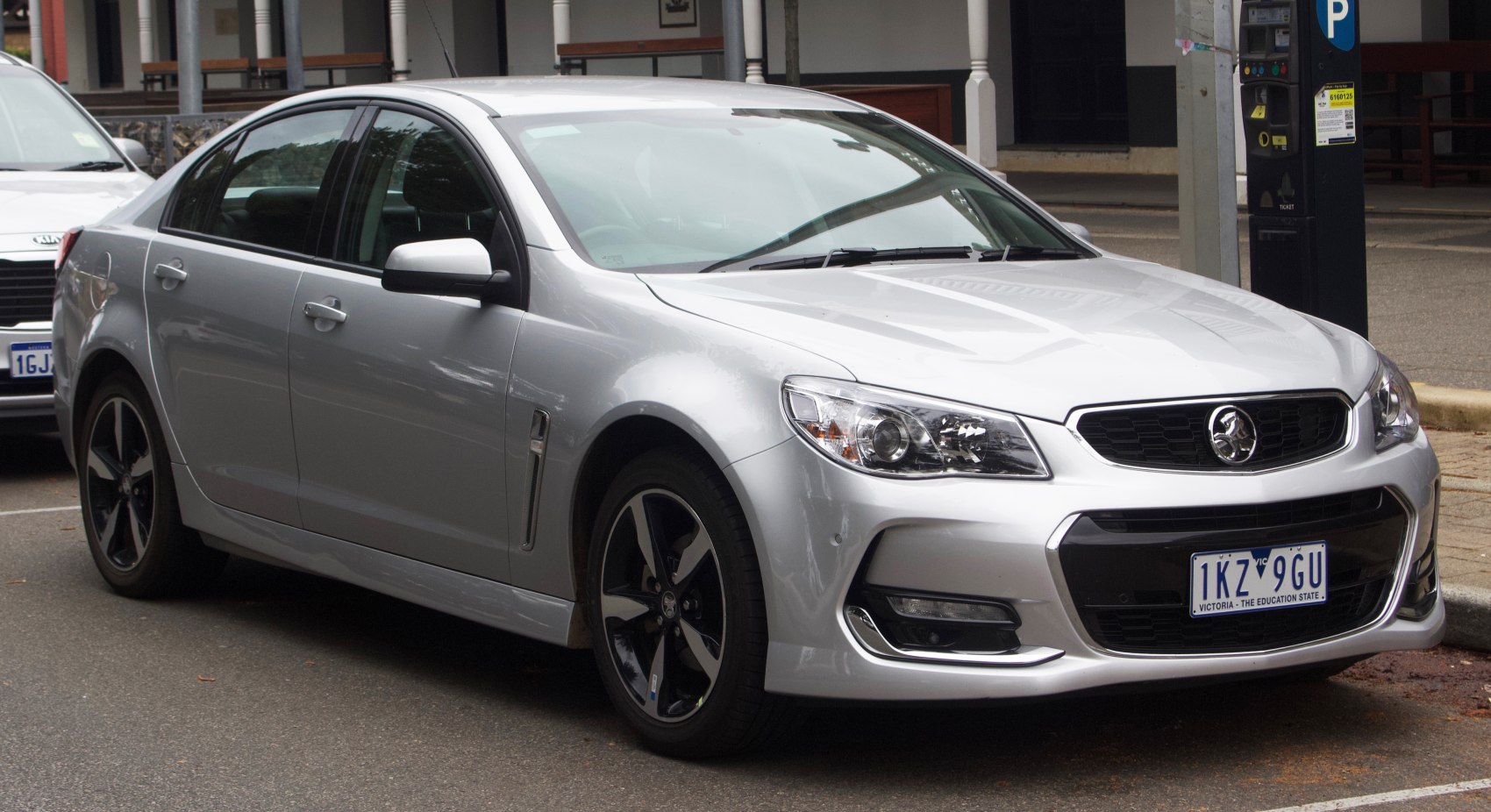 Silver sedan with modern headlights and alloy wheels