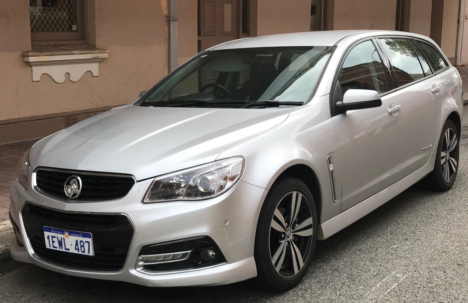 Silver wagon with modern grille and alloy wheels, front side view