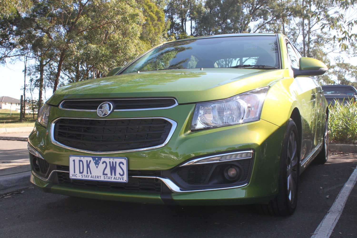 Front view with headlights and chrome-trimmed grille
