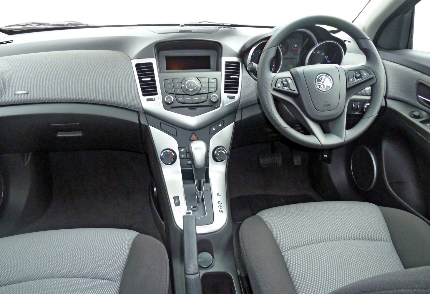 Dashboard, steering wheel, and center console interior layout