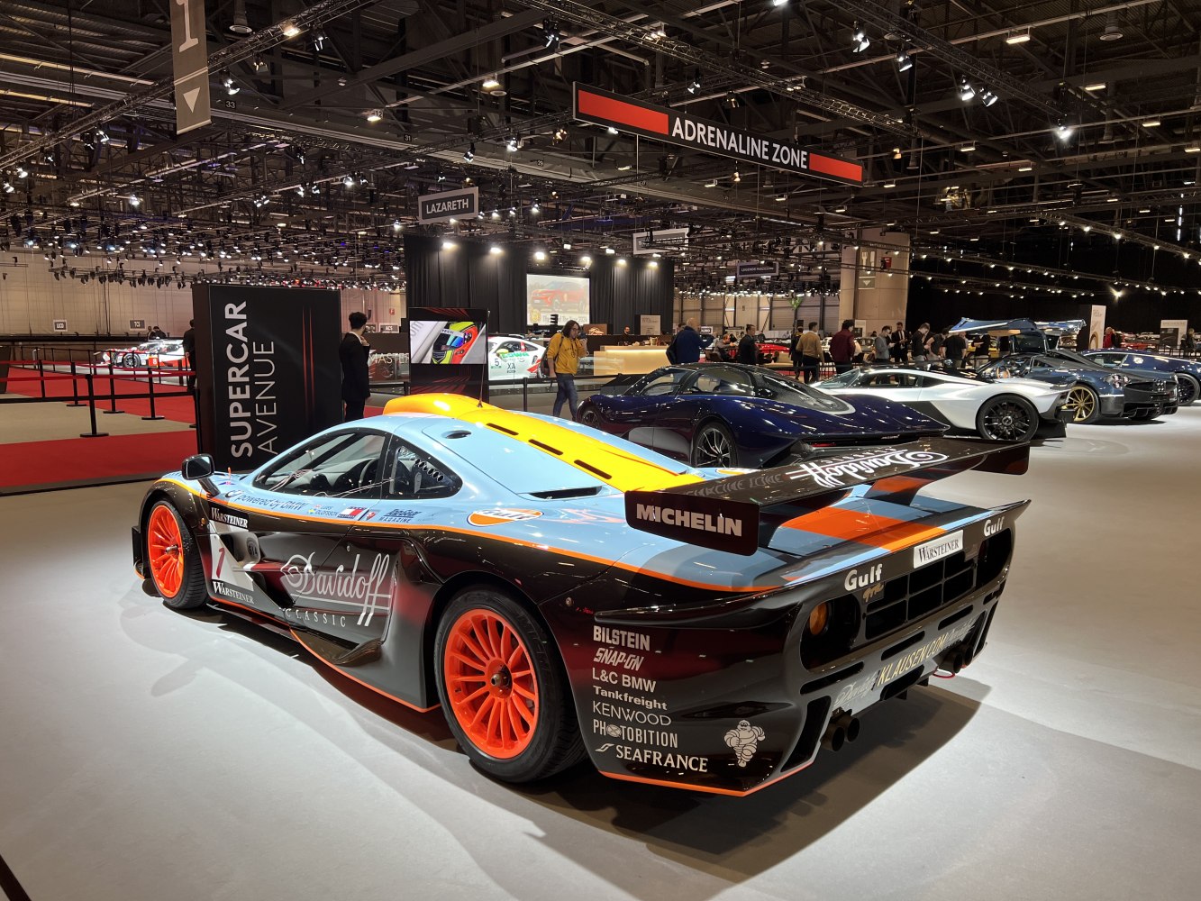 Rear and side view of a 1995 race car with racing wing and Gulf livery