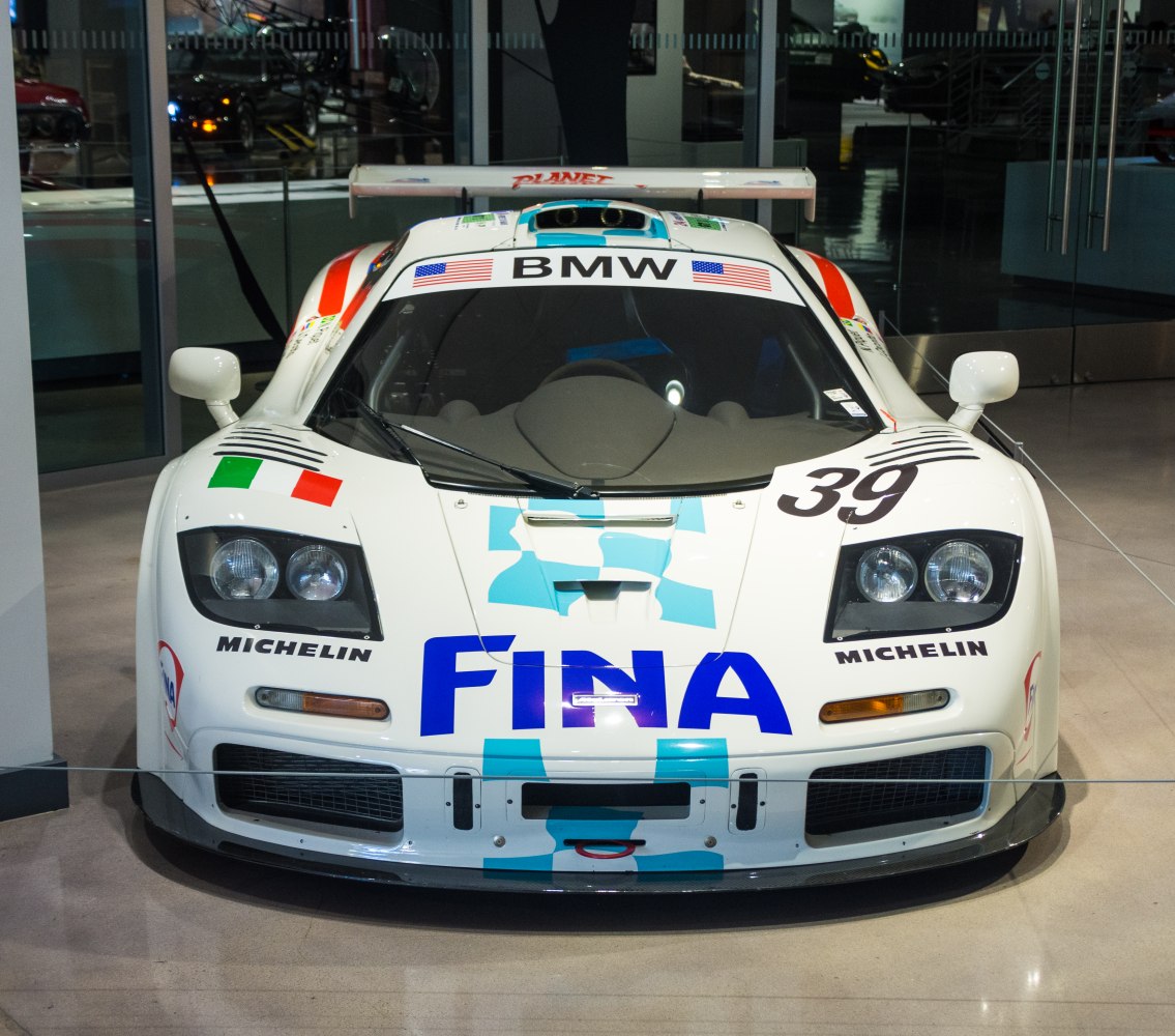 Front view of a racing car with FINA livery, number 39, and BMW windshield banner