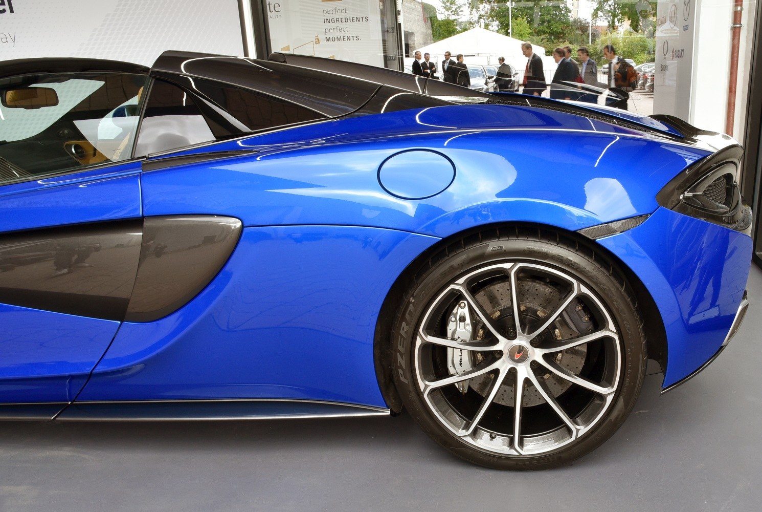 Rear side profile and striking alloy wheel with aerodynamic features