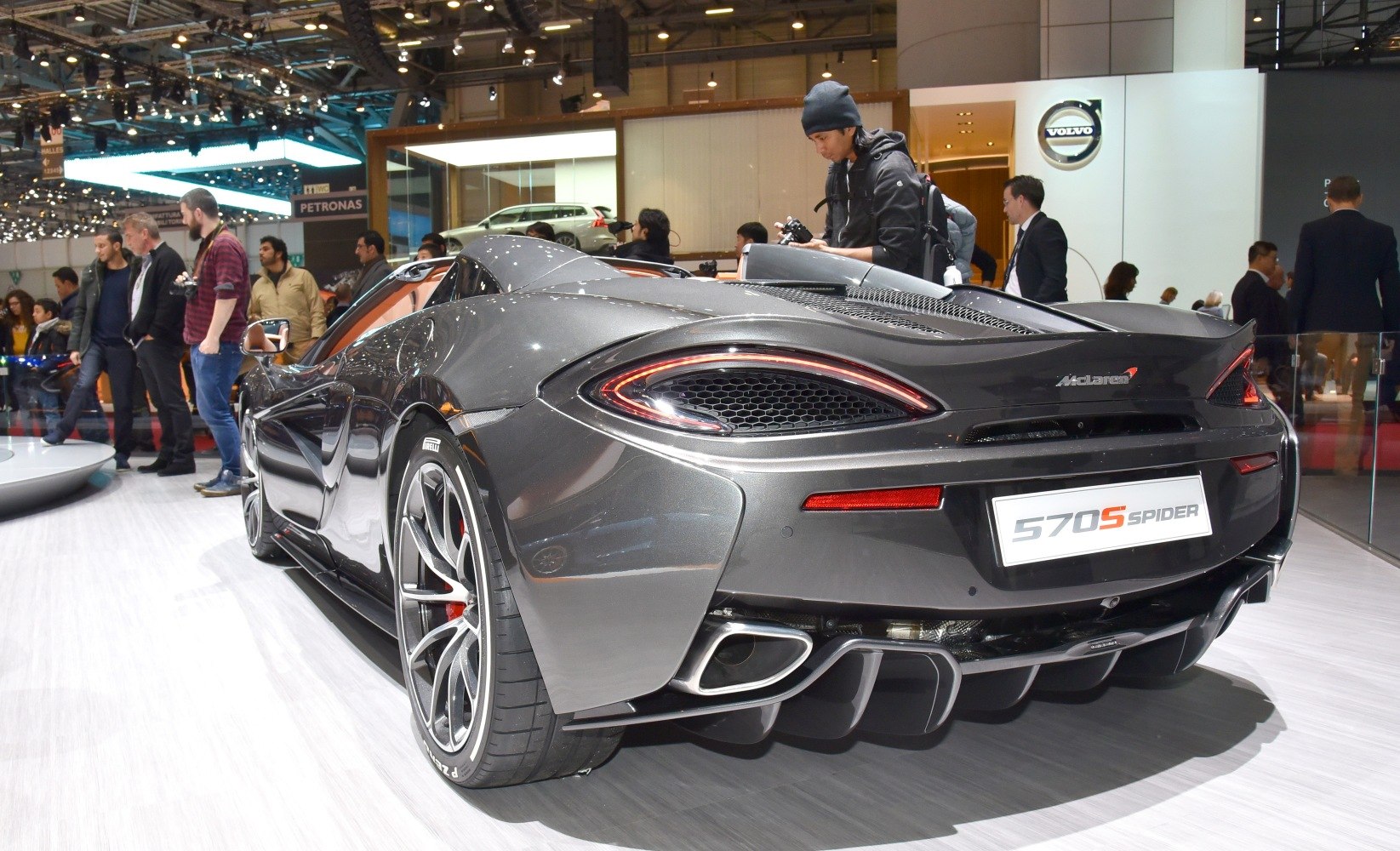Rear view showing dual exhaust and sleek taillights