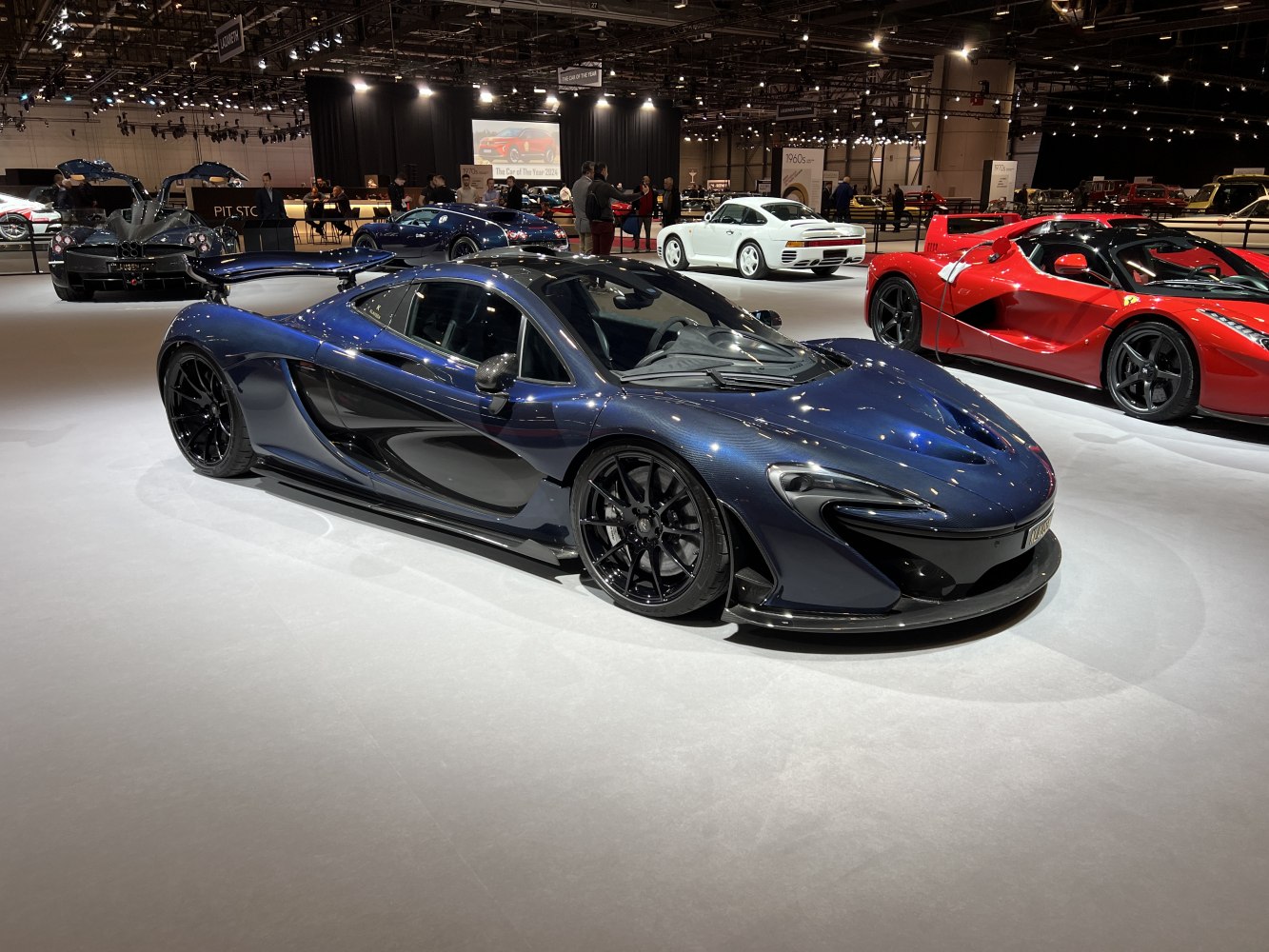 Carbon fiber bodywork and large rear wing on a hypercar.