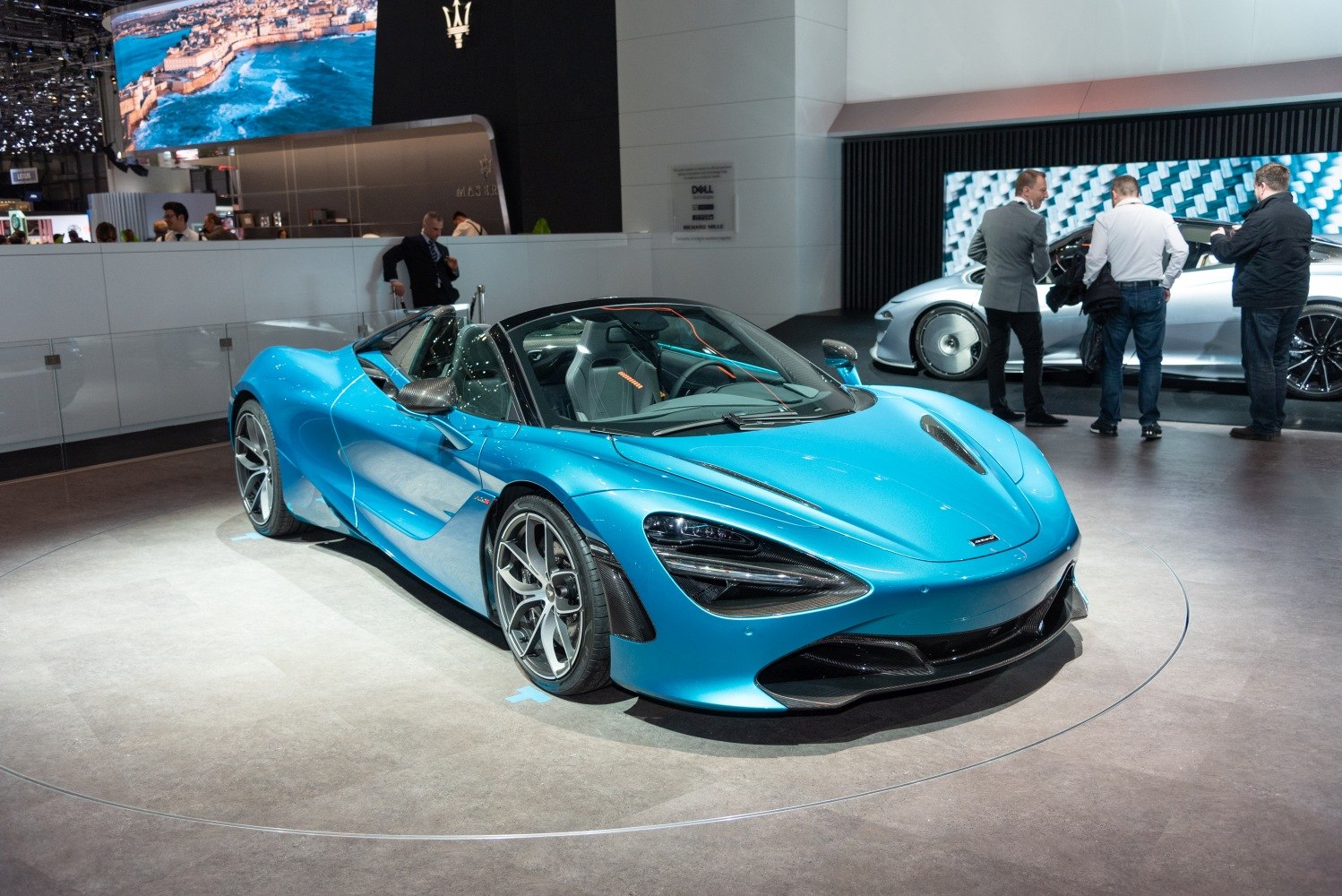 Blue high-performance convertible sports car front quarter view