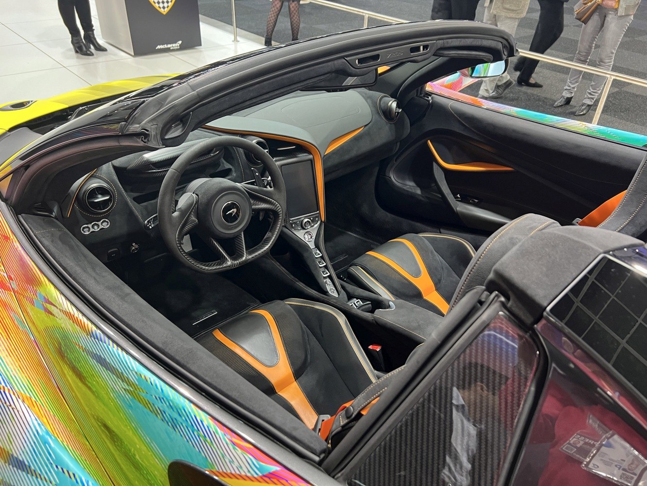 Sporty seats and steering wheel in convertible high-performance car interior