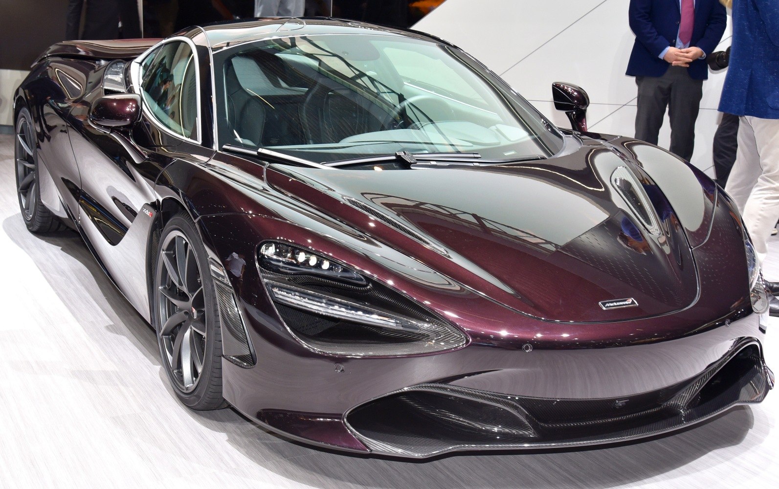 Aerodynamic front with sleek headlights and side air intakes.