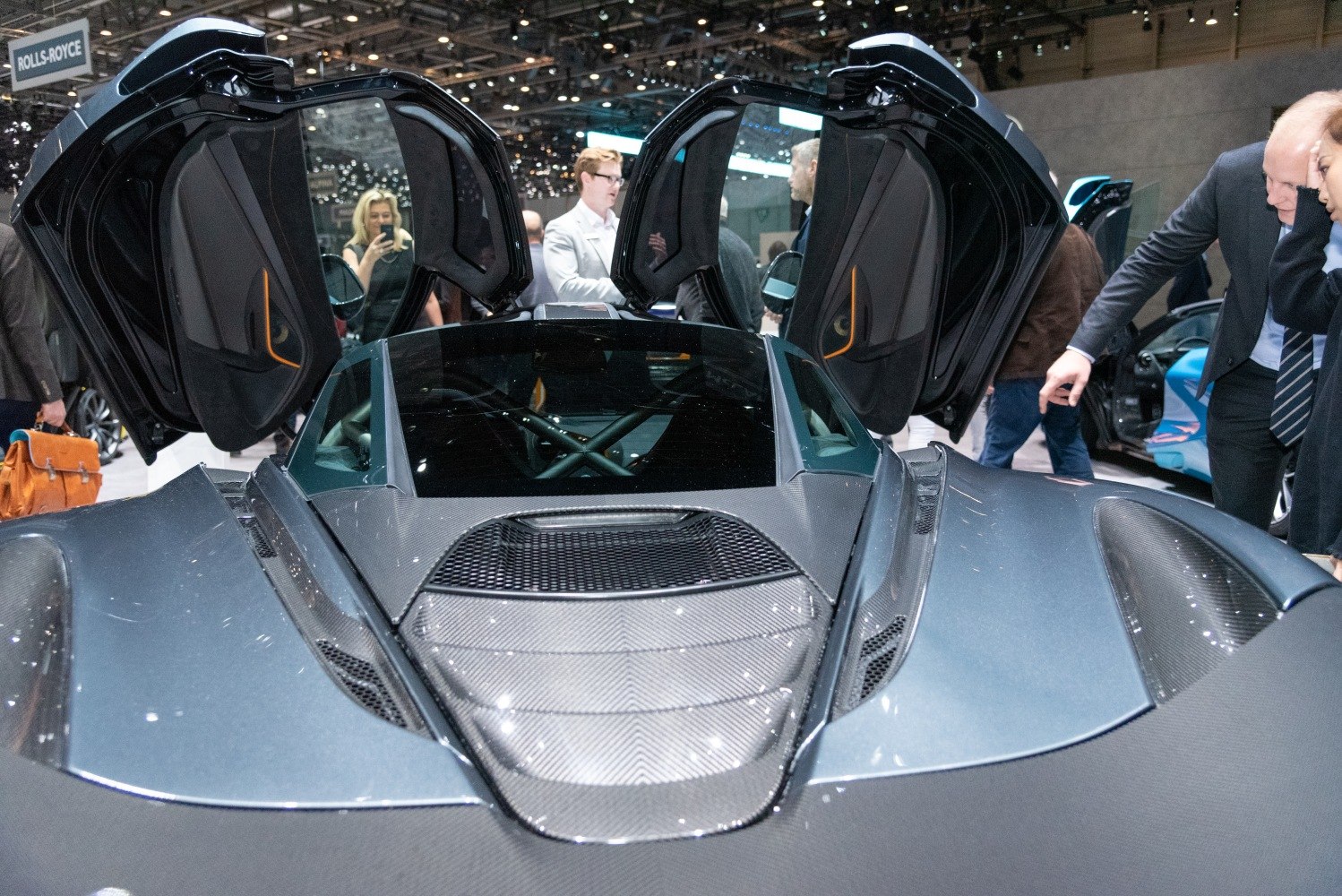 Butterfly doors and carbon fiber hood of a supercar