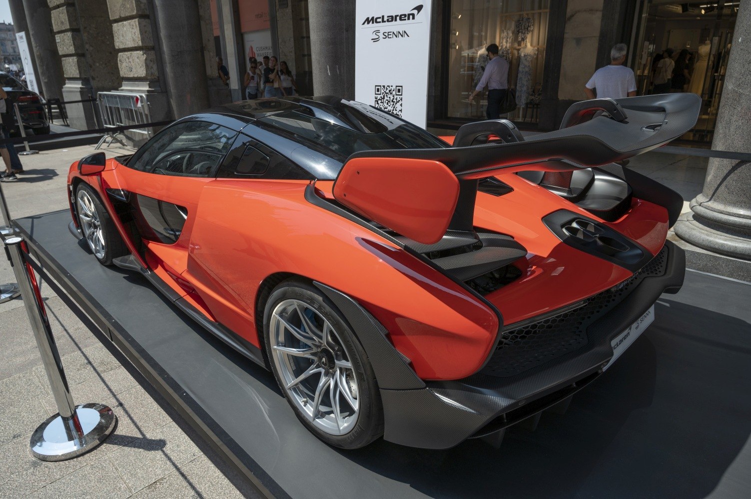 Rear view of 2019 performance car with large rear wing and aerodynamic elements