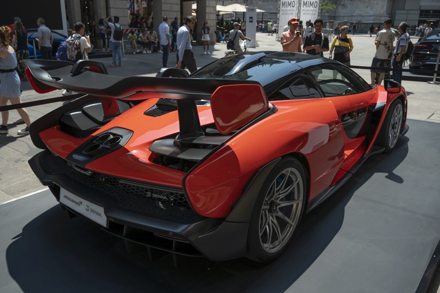 Rear view with large aerodynamic wing and intricate bodywork.