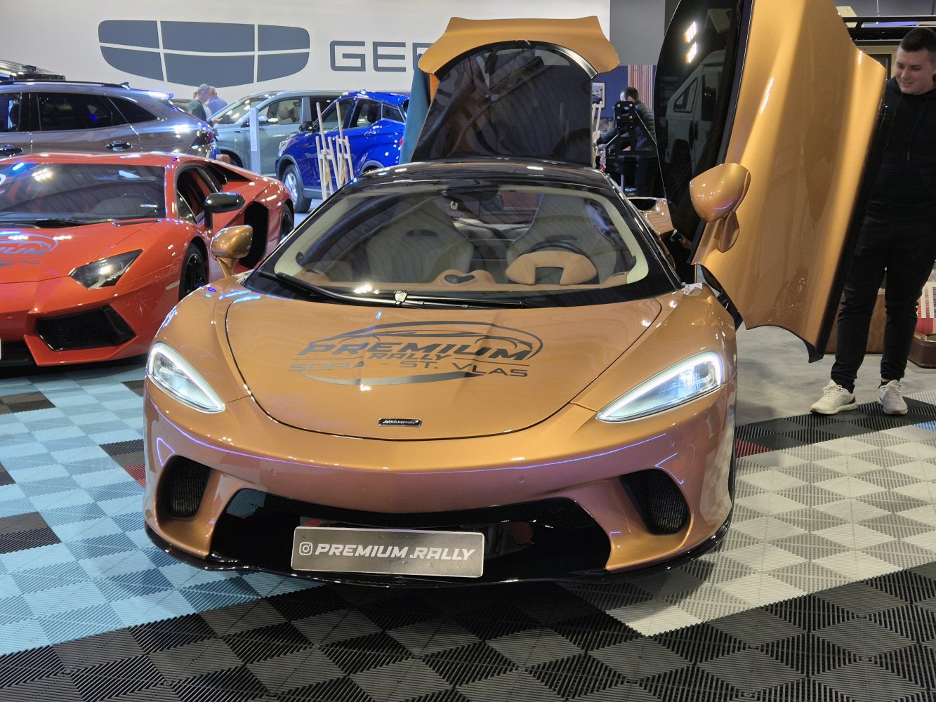 Sports car with butterfly doors and aerodynamic front design