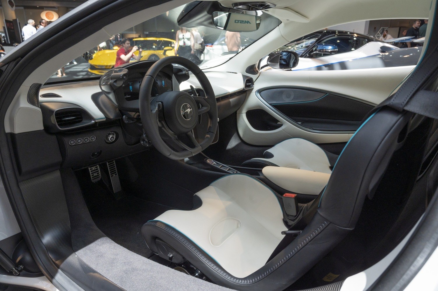 Sport seats and steering wheel of a luxury car interior