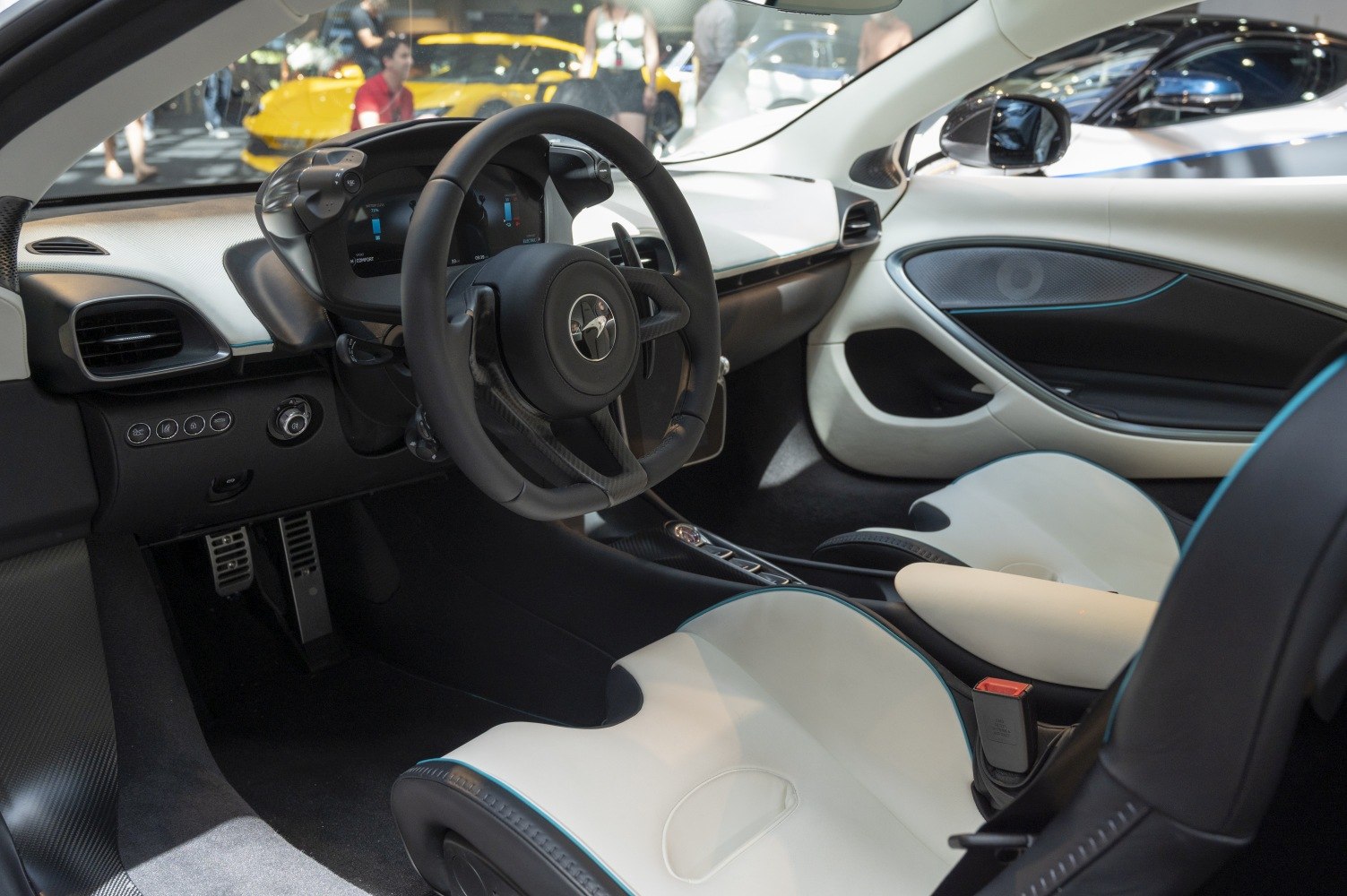 Modern digital dashboard and ergonomic steering wheel with luxury seating