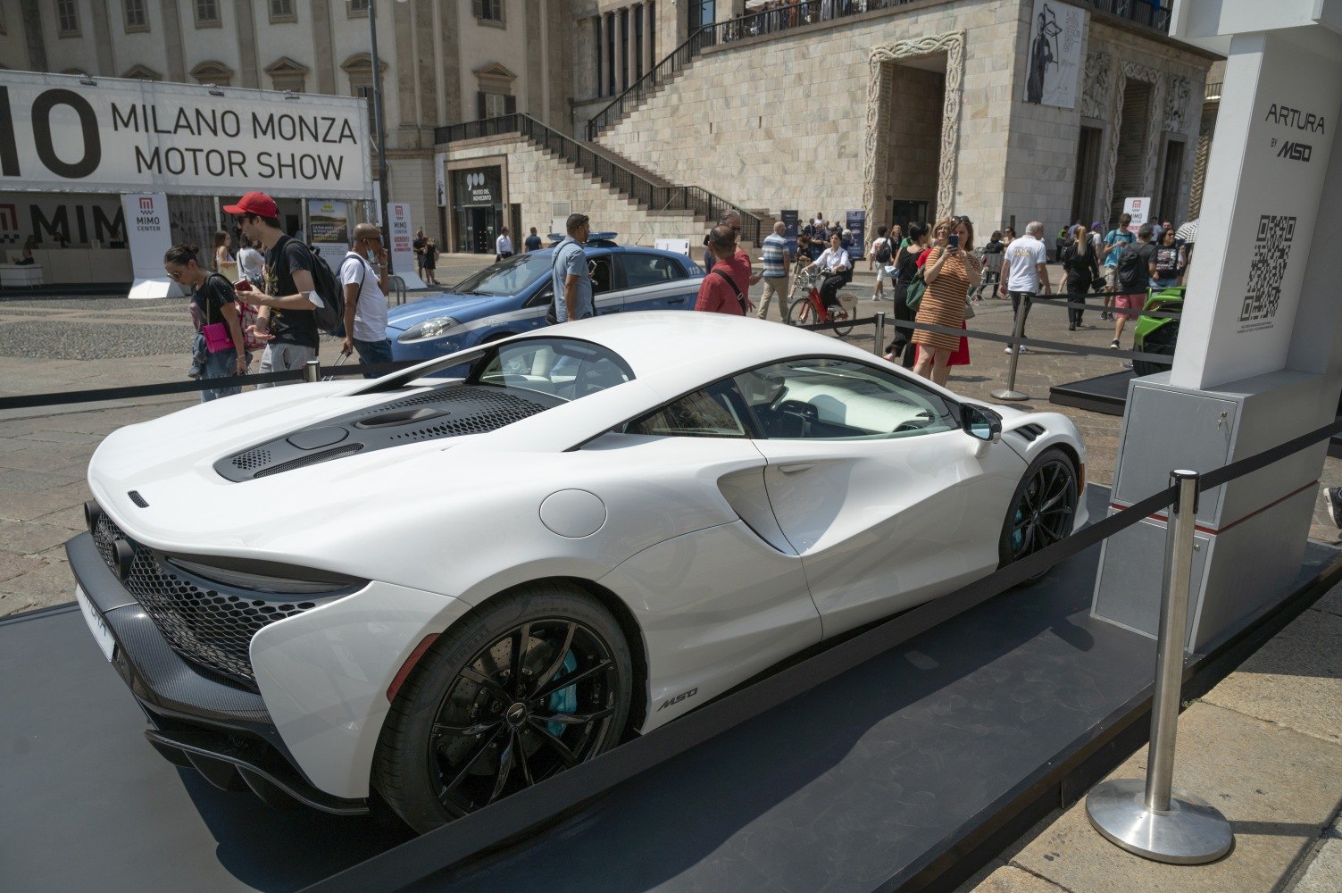 White supercar rear with aerodynamic design and black wheels