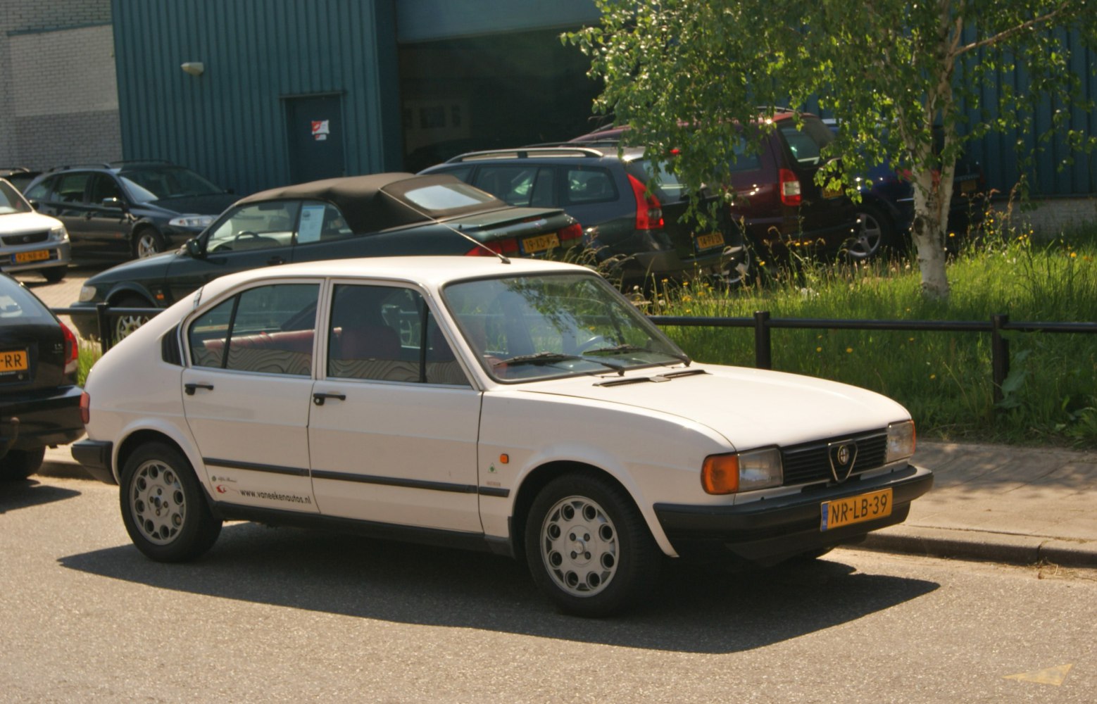 Classic vintage hatchback with distinctive front grille and clean side profile
