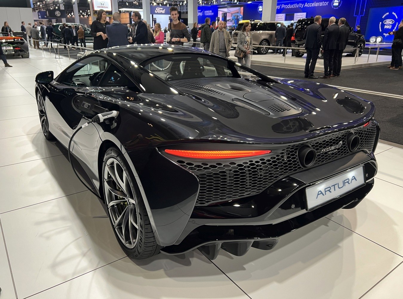 Rear design and electric charging port on a modern hybrid supercar