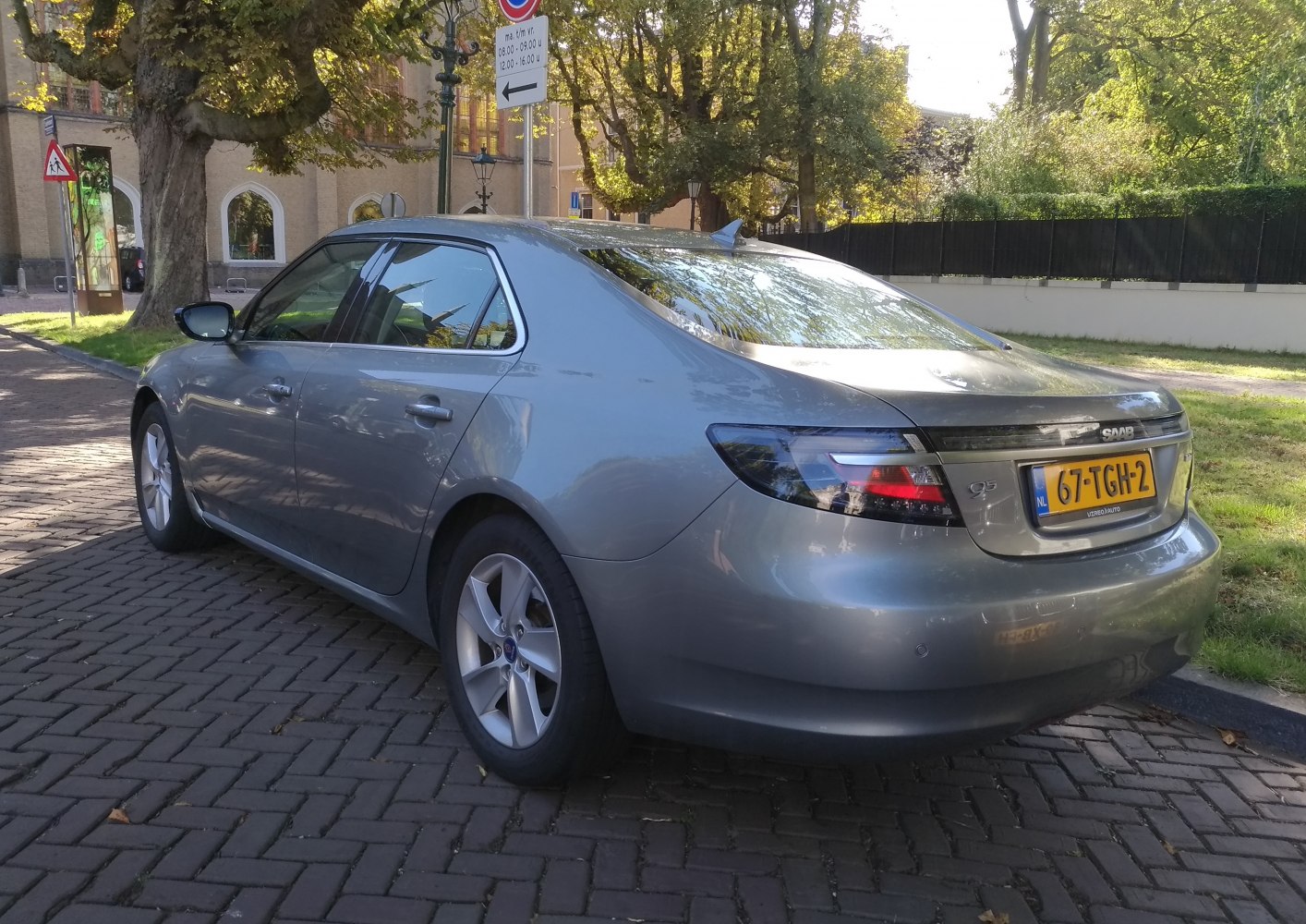 Rear side view of a sedan with distinctive rear lights and aerodynamic shape