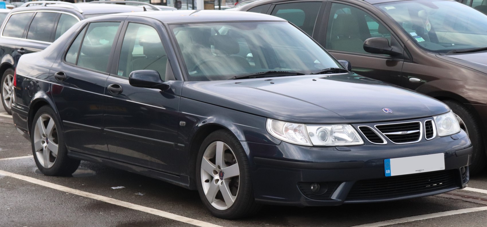 Sedan front side view with headlight design and alloy wheels