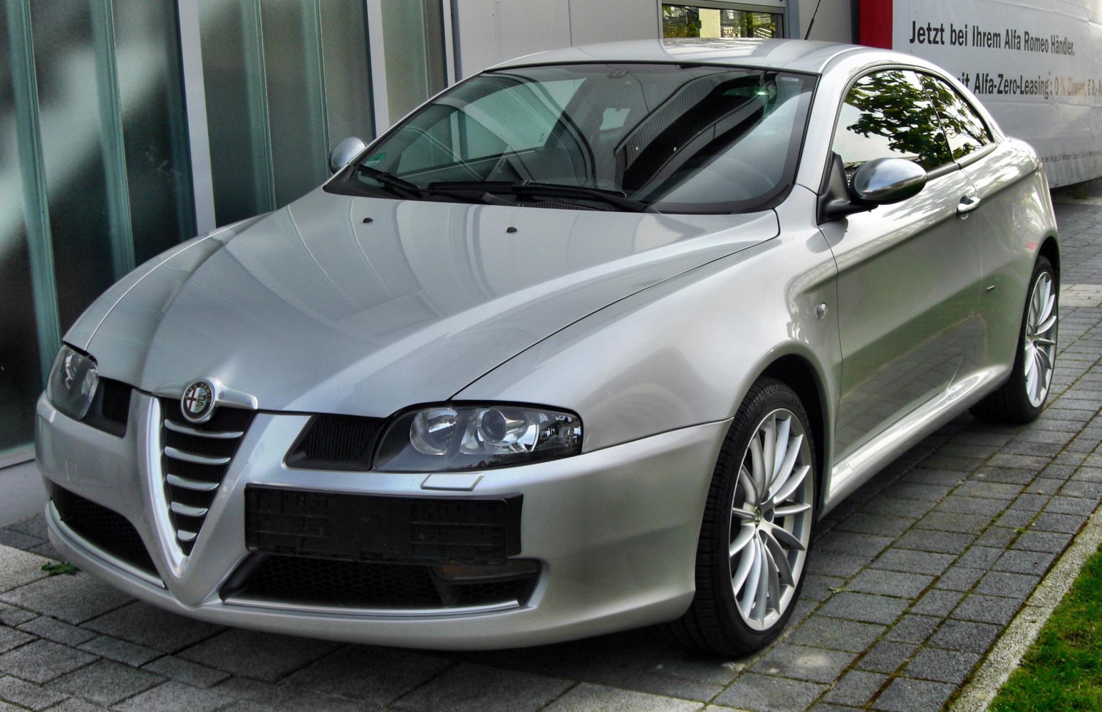 Silver GT Coupe front side with Alfa Romeo grille and alloy wheels