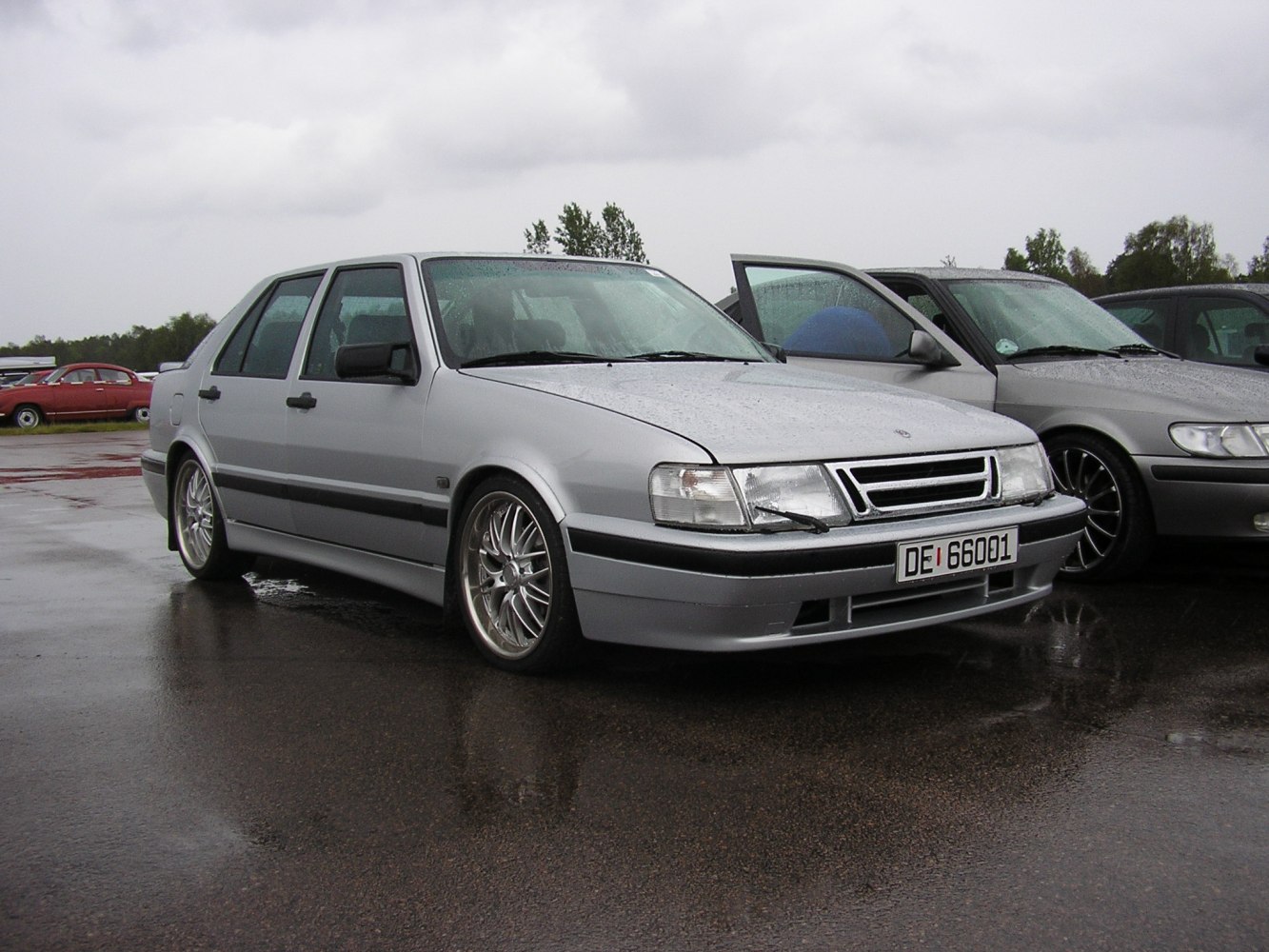 Silver hatchback with distinctive front grille and sporty alloy wheels