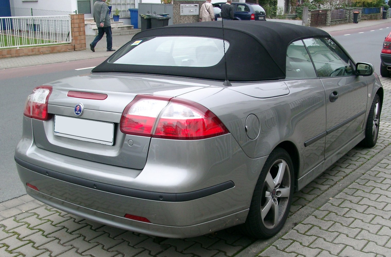 Rear view of convertible with soft top and distinctive taillights