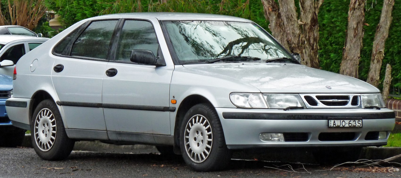 Silver hatchback with aerodynamic shape and distinctive front grille
