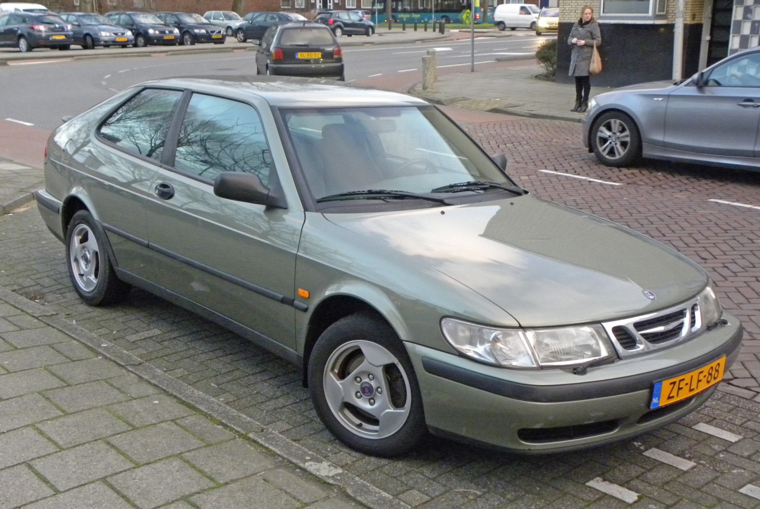 Sedan with three-spoke alloy wheels and aerodynamic body lines.