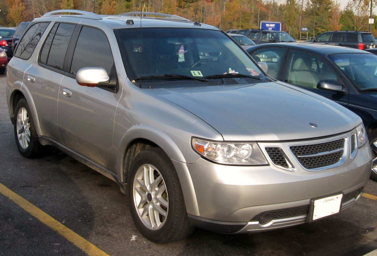 SUV with unique grille and alloy wheels, front-side view.