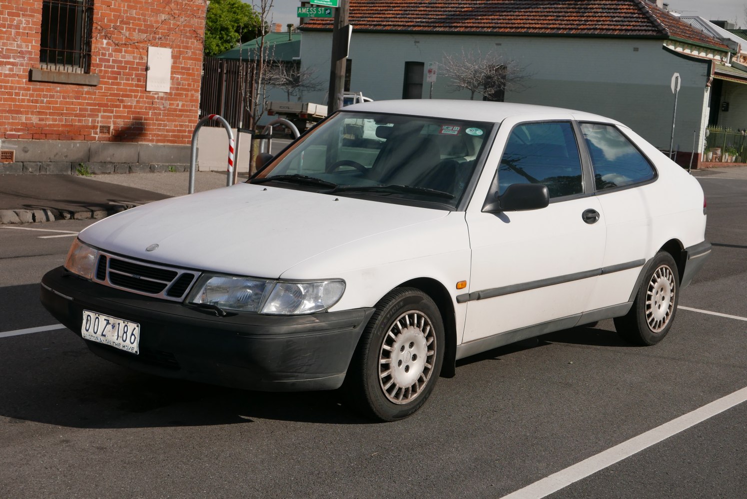 Front-side profile of a hatchback with distinct headlight and wheel design
