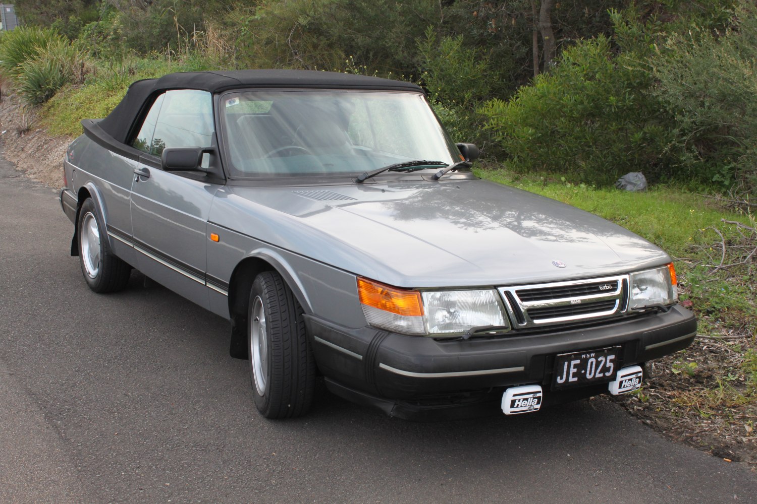Convertible with folded soft top and turbo front grille