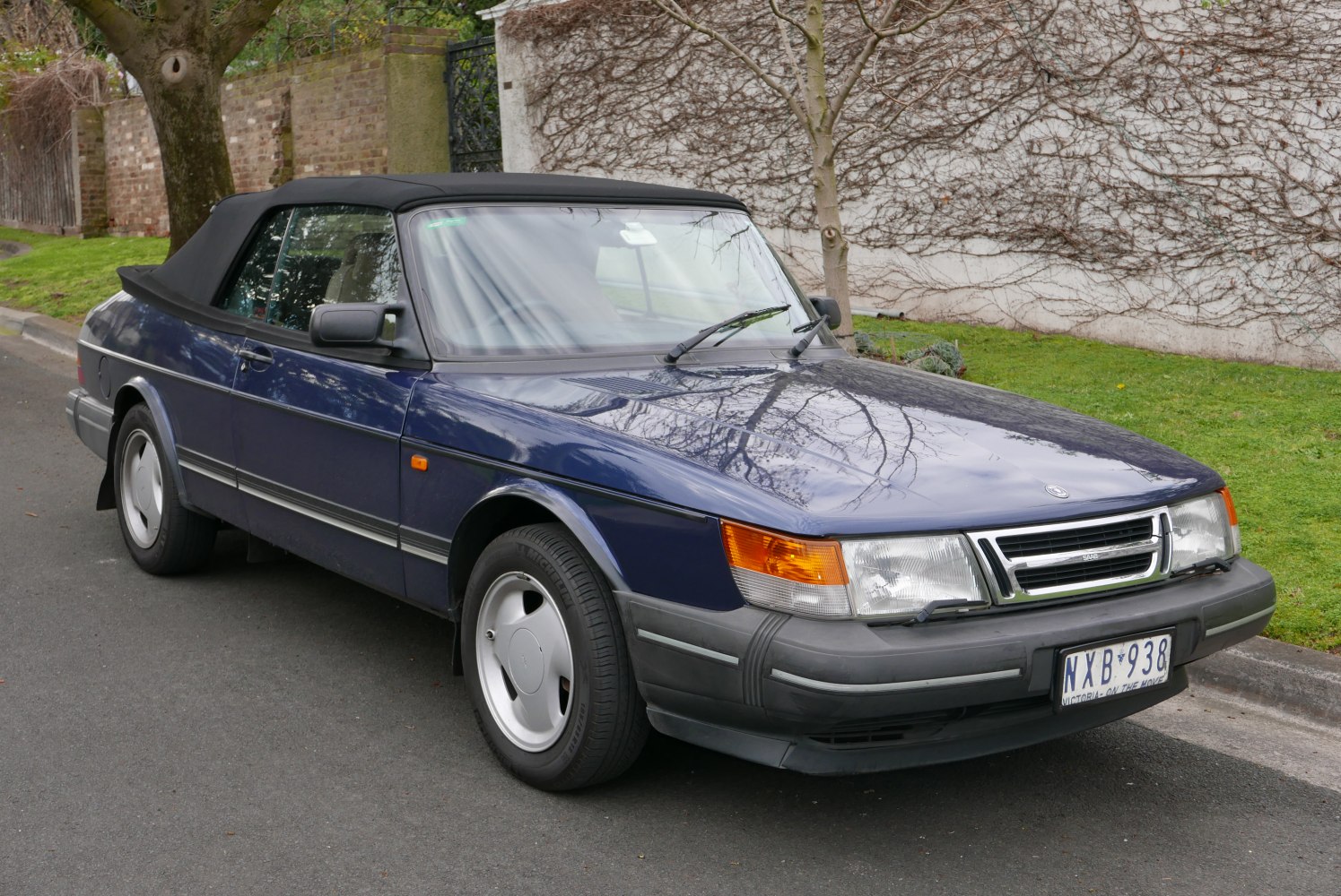 Vintage convertible with soft top and classic 1980s body design