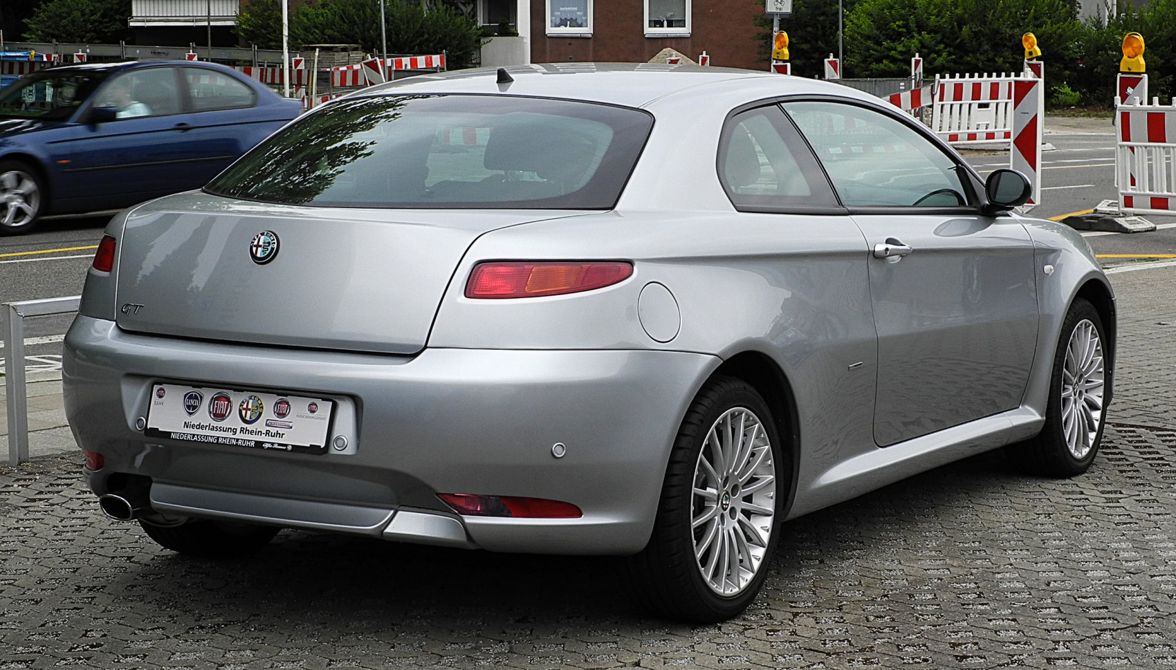 Rear view with sleek taillights and silver alloy wheels