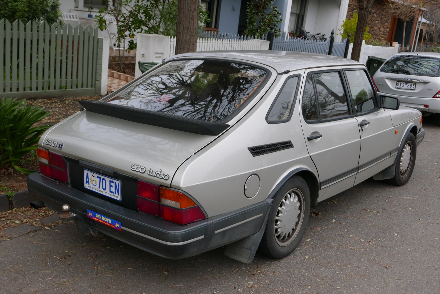 Rear hatch, spoiler, and taillights of a vintage hatchback