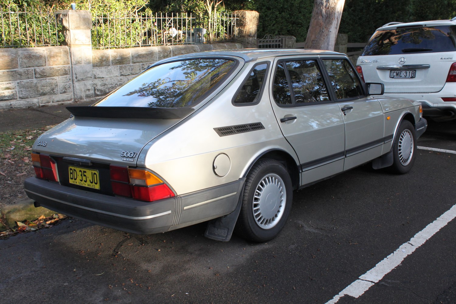 Rear profile of a hatchback with a distinctive rear spoiler
