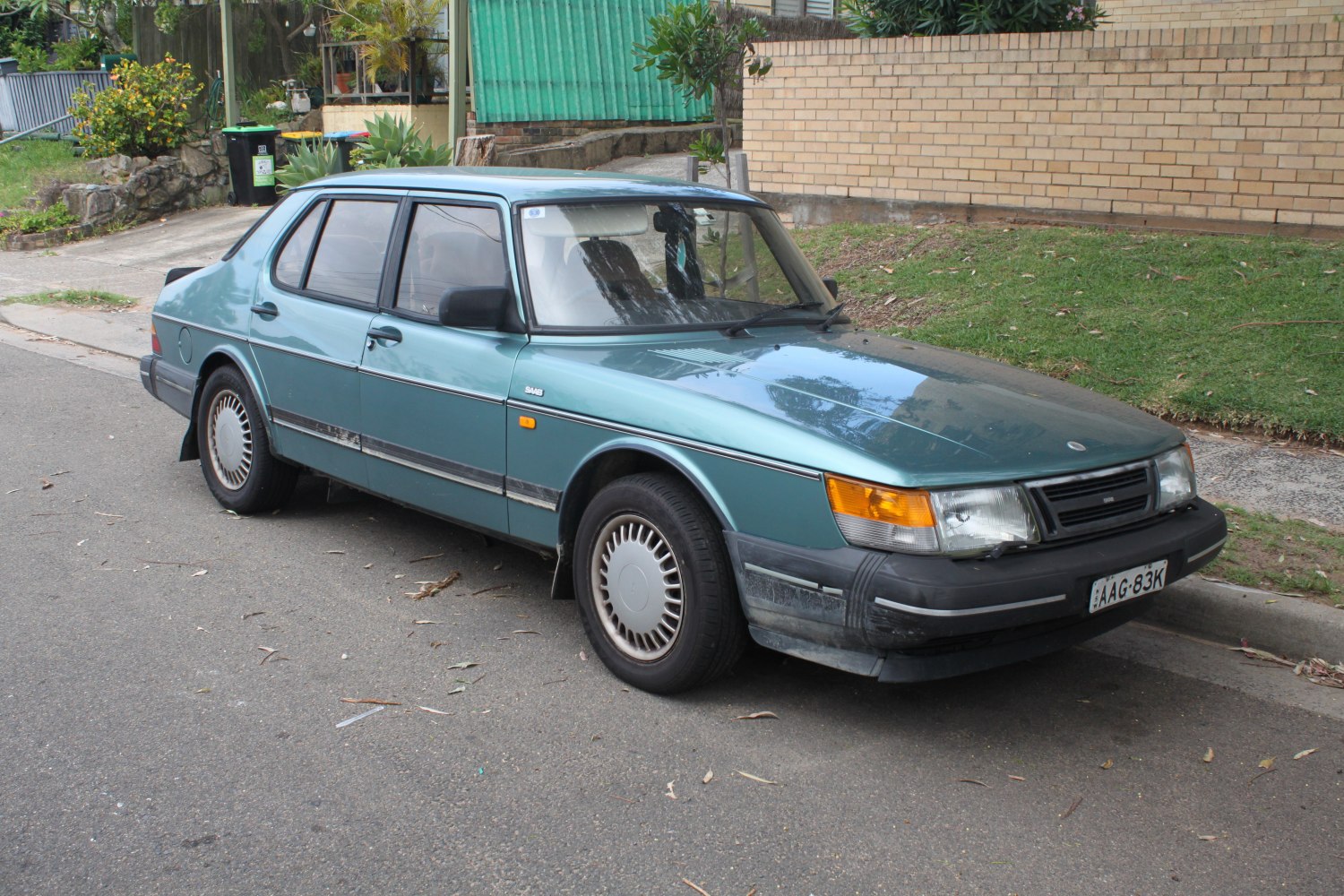 Angular sedan with black bumpers and vintage design elements