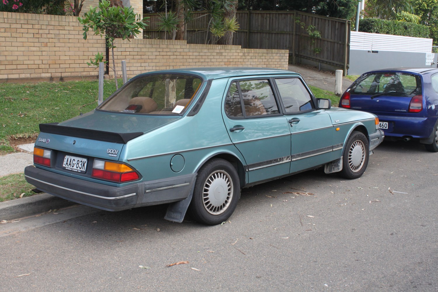 Rear hatchback view with spoiler and classic tail lights