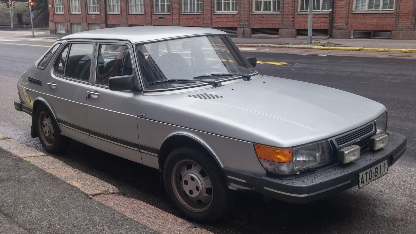 Front and side view of classic 1970s vehicle with distinctive boxy design.