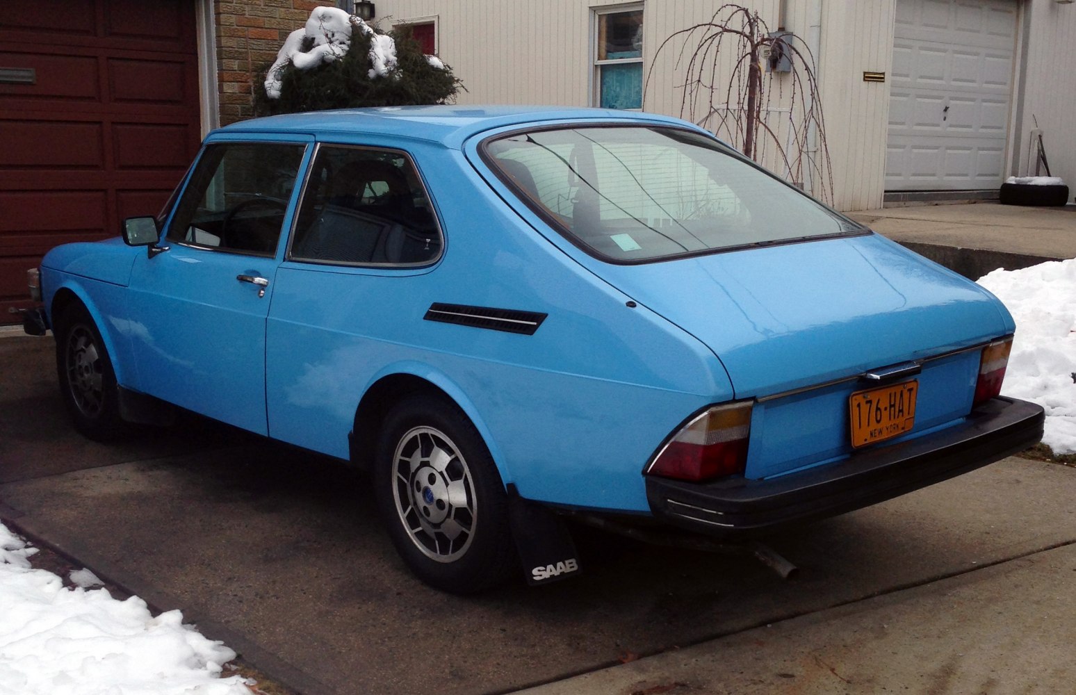 Blue 1970s fastback rear with distinctive tail lights and steel wheels