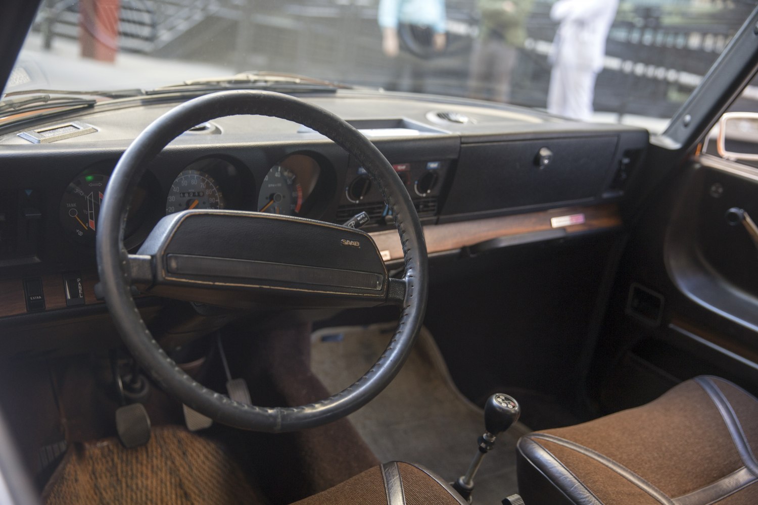 Vintage steering wheel, classic dashboard, manual gear stick interior