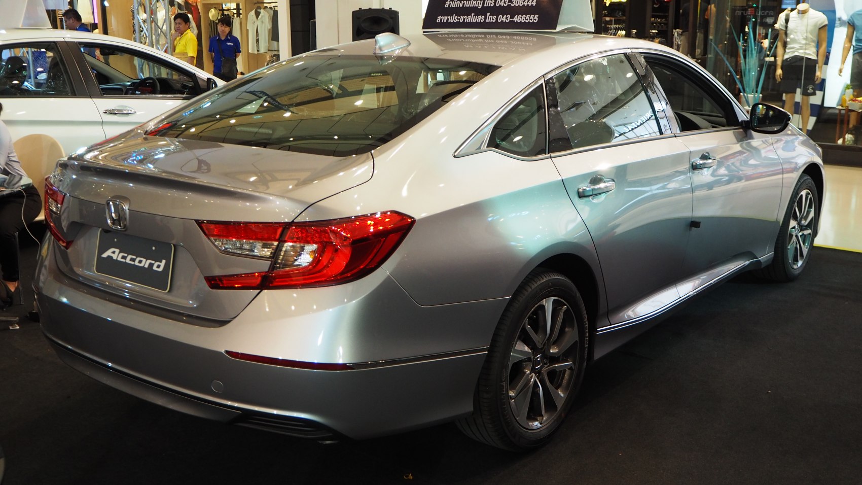 Silver sedan rear and side view with alloy wheels