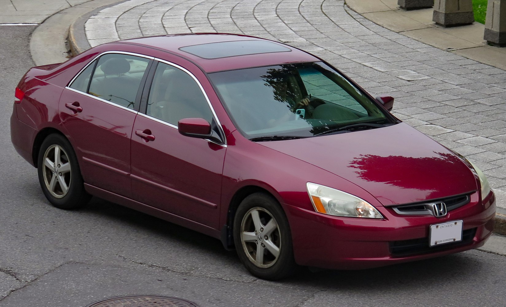 Sunroof and alloy wheels on mid-size sedan