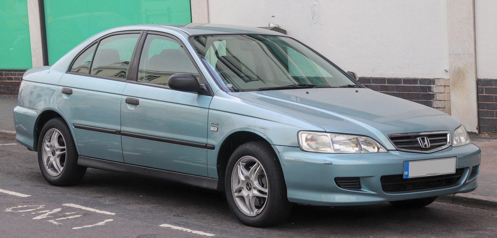 Classic 1998 sedan with alloy wheels and VTEC emblem