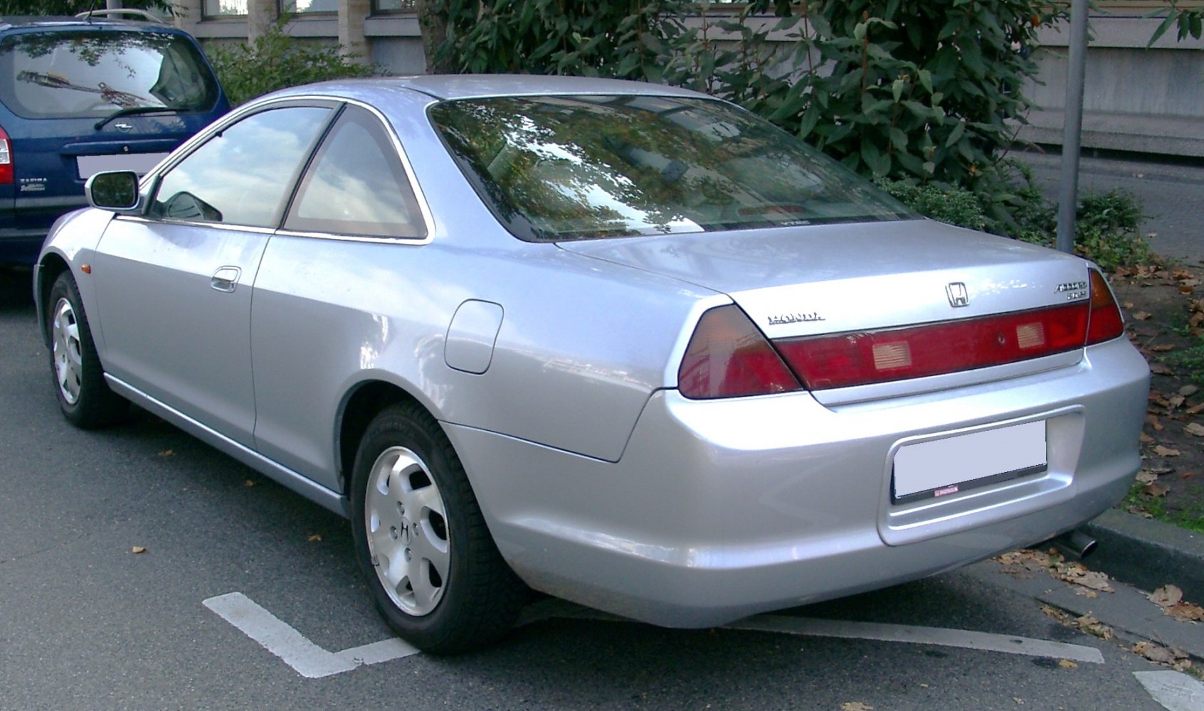 Silver sporty 2-door coupe rear with distinctive taillights